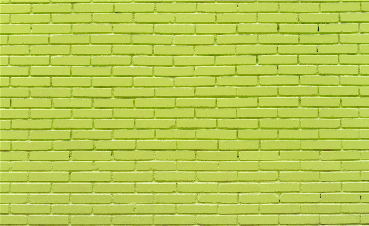 Фотошпалери Цегляна стіна в світло-зеленому відтінку