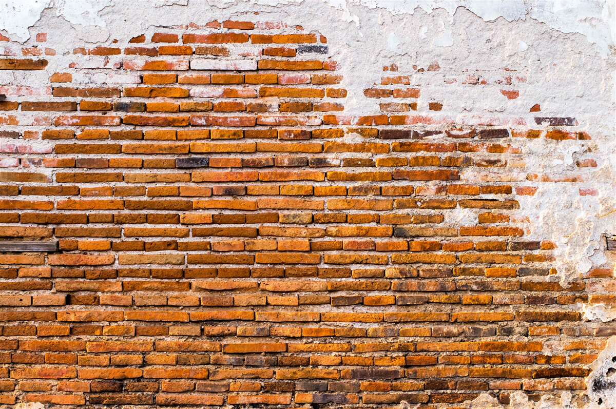 Фотошпалери стара цегляна стіна, яка втратила свій вигляд