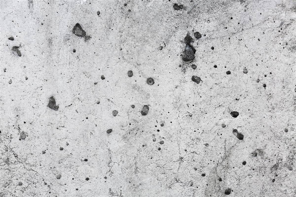 Фотошпалери бетонна стіна з темними відмітинами