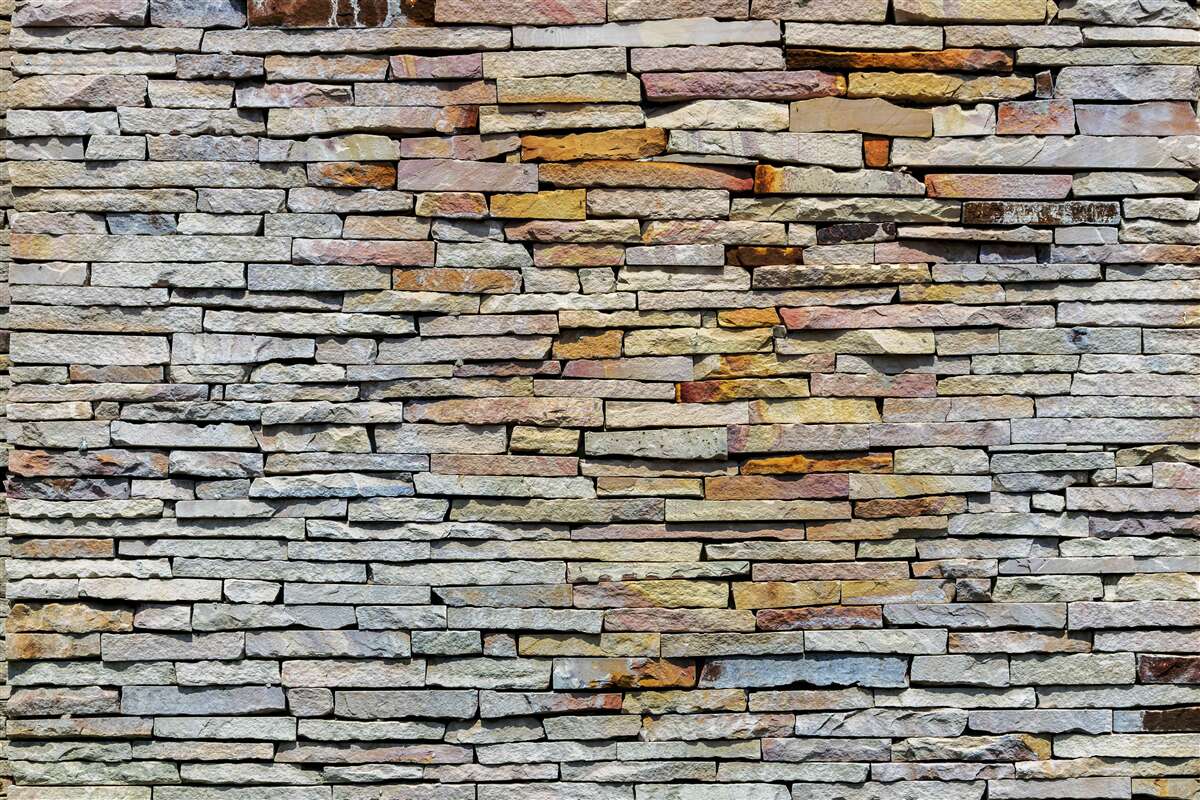 Фотошпалери Стіна покрита кам'яними смугами