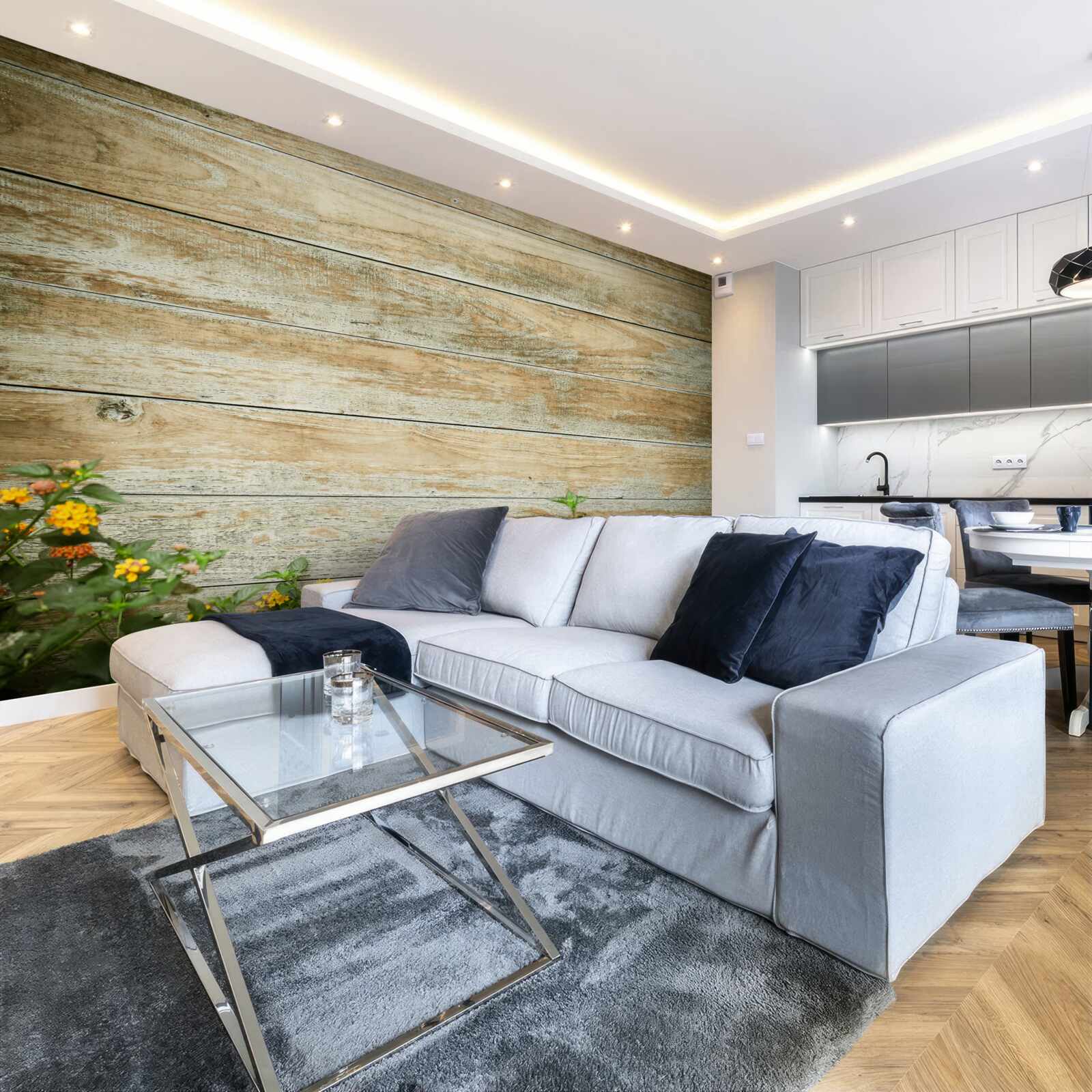 Фотошпалери жовті квіти на тлі паркету в оточенні зелені