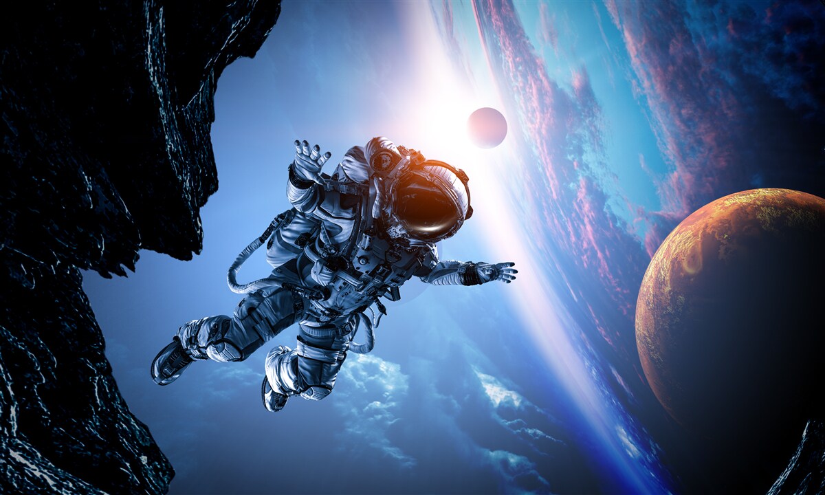 Фотошпалери астронавт у Всесвіті