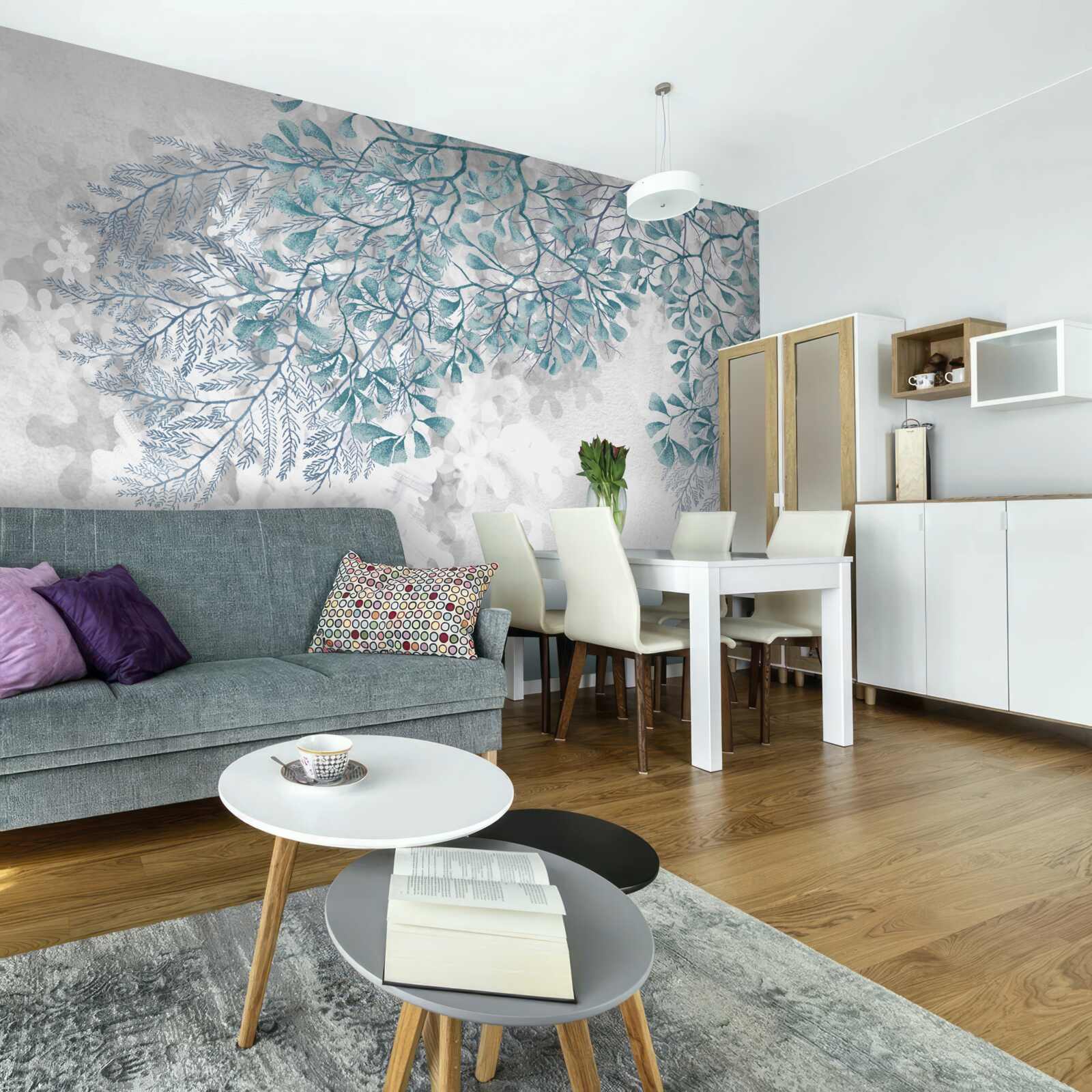 Фотошпалери на світлому тлі видно гілки з бірюзовим листям