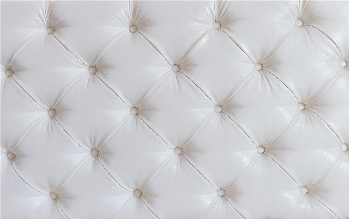 Фотошпалери біла шкіряна оббивка з декором зі стразів