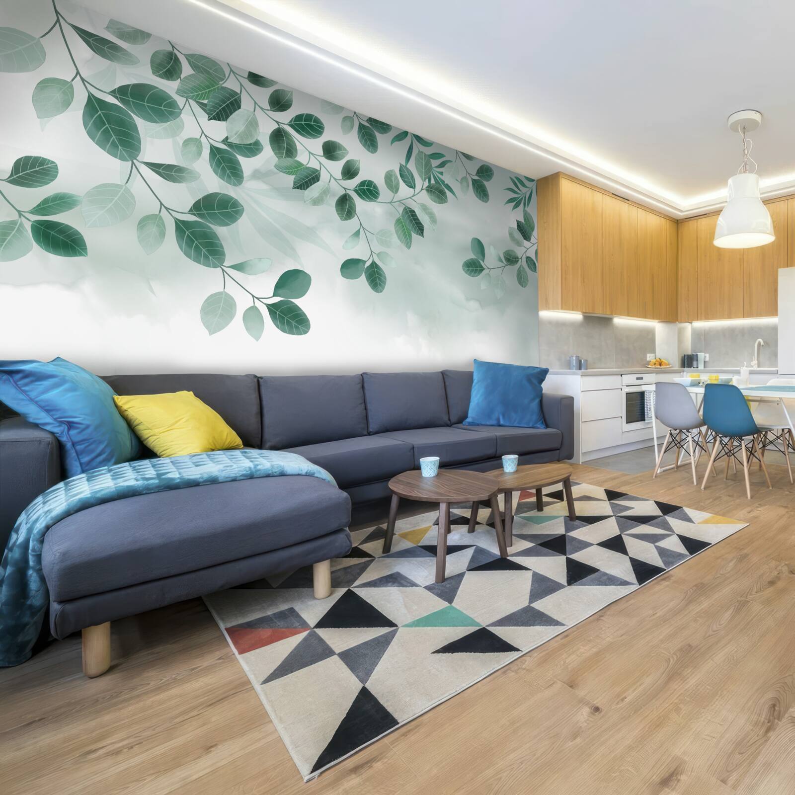 Фотошпалери гілки з зеленим листям, що розкинулися на тлі неба