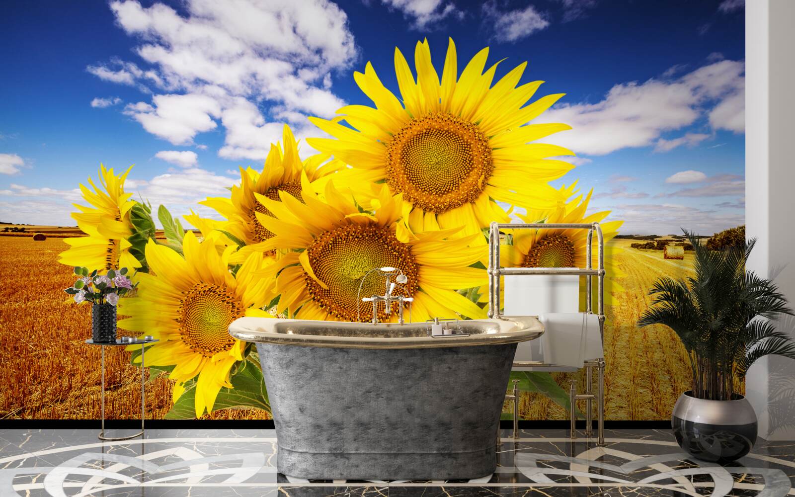 Фотошпалери на тлі неба і поля пшениці видніється букет соняшників