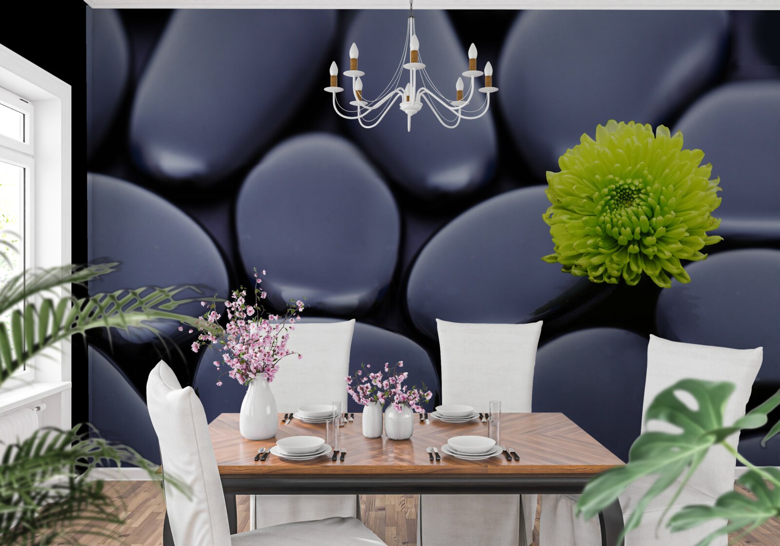 Фотошпалери зелена квітка росте над кам'янистим бар'єром