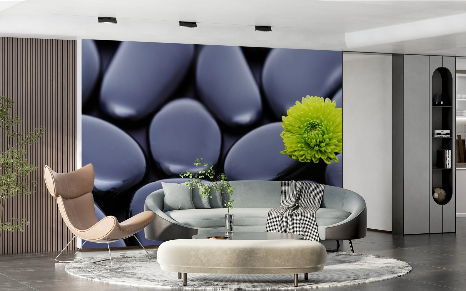 Фотошпалери зелена квітка росте над кам'янистим бар'єром