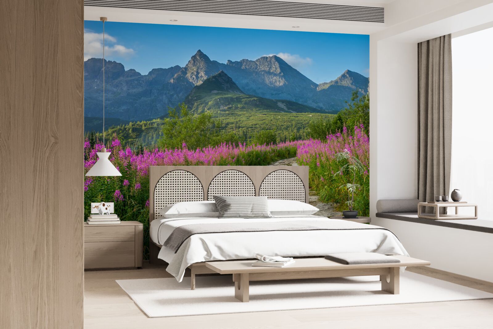 Фотошпалери Стежка посеред квітучого поля в гірській місцевості