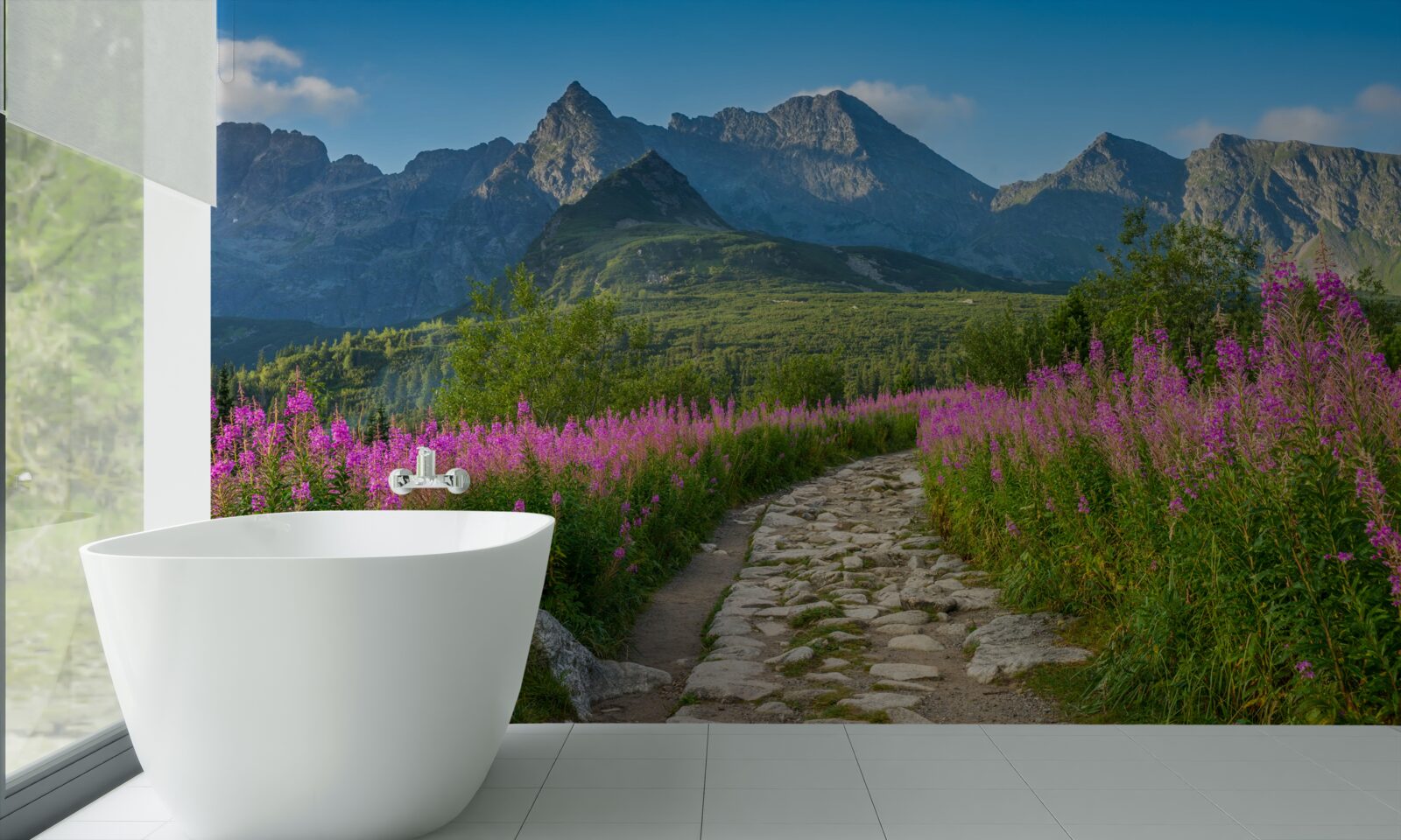 Фотошпалери Стежка посеред квітучого поля в гірській місцевості