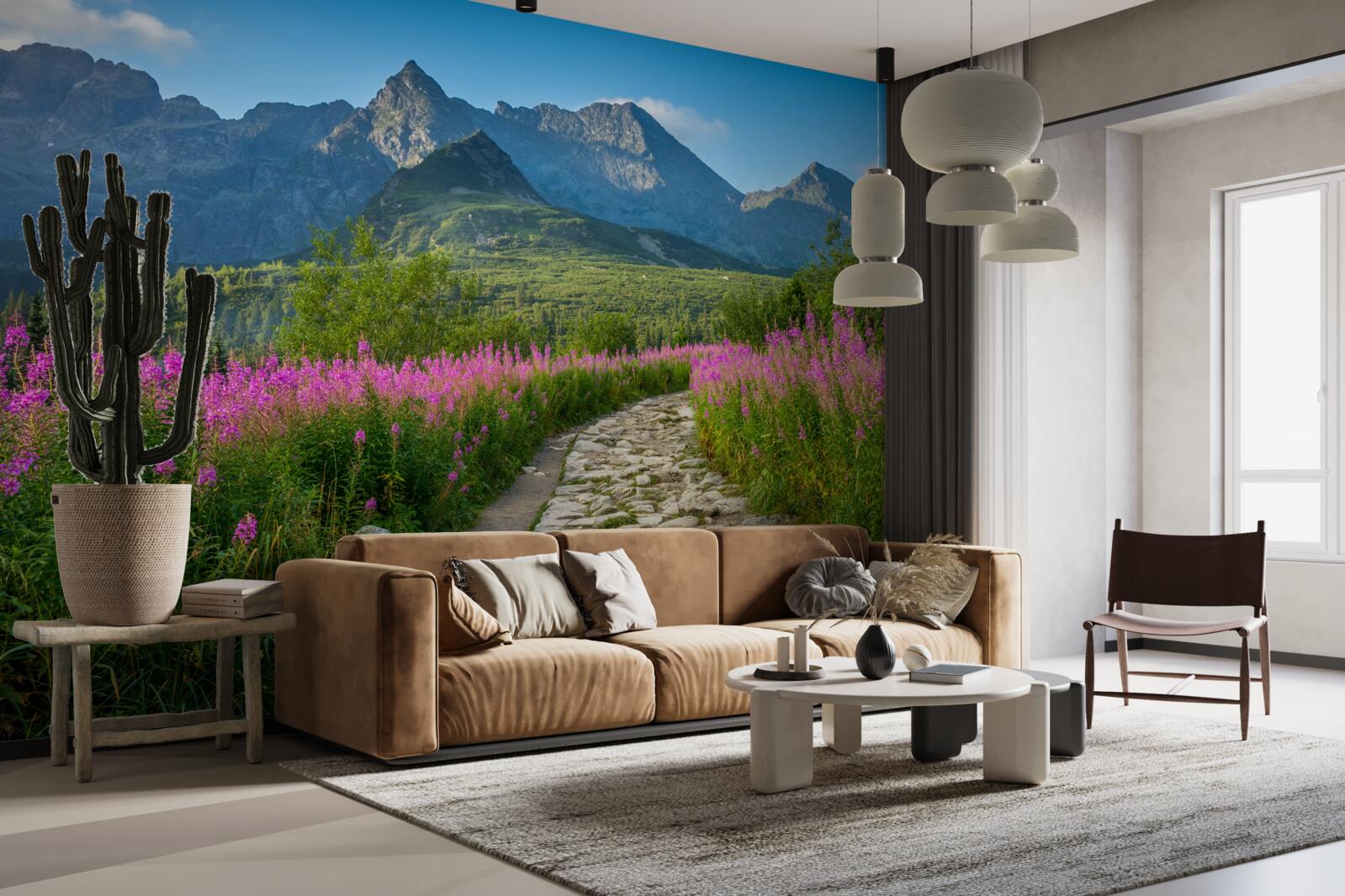 Фотошпалери Стежка посеред квітучого поля в гірській місцевості