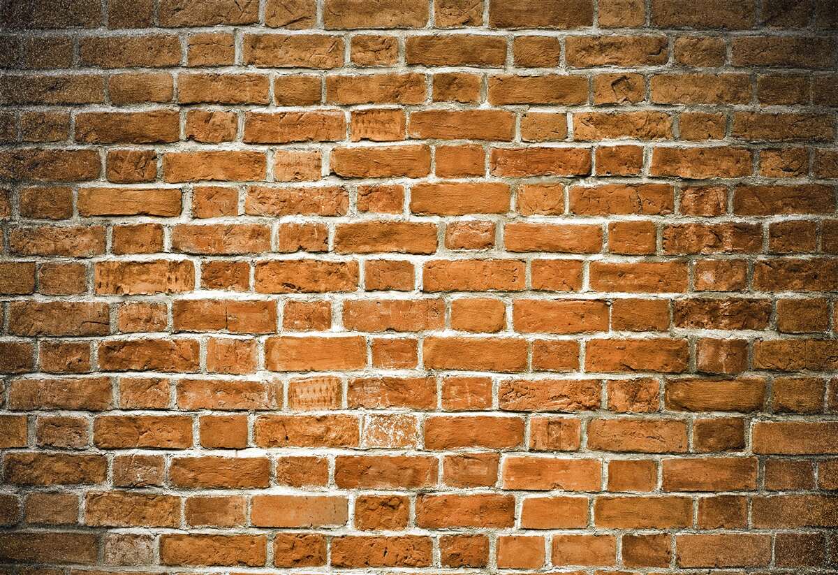 Фотошпалери коричнева цегляна стіна