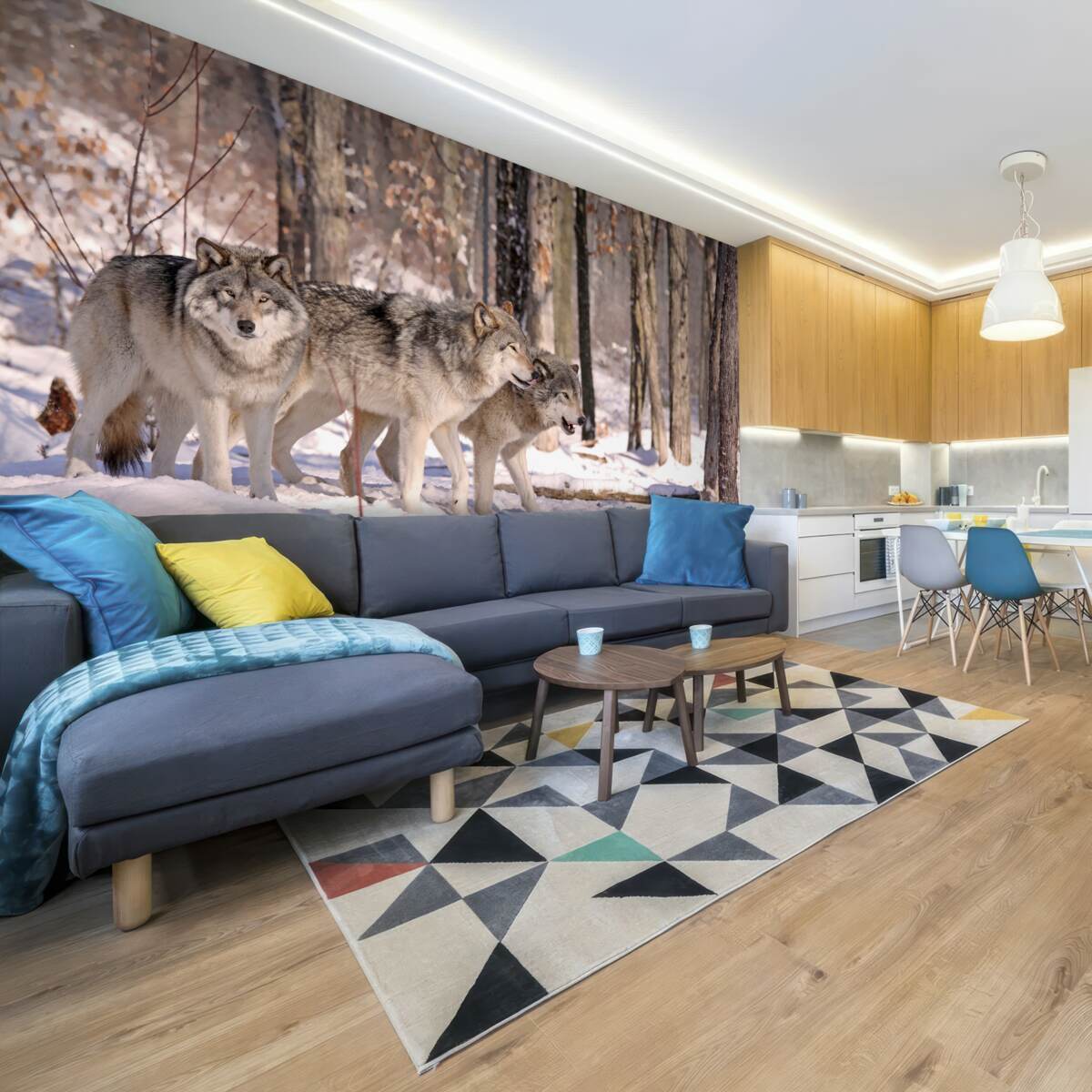 Фотошпалери група вовків йде крізь хащі зимового лісу