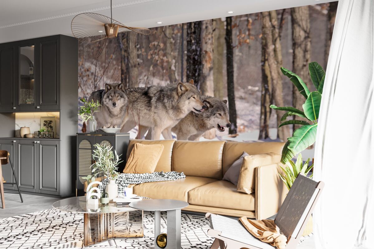 Фотошпалери група вовків йде крізь хащі зимового лісу