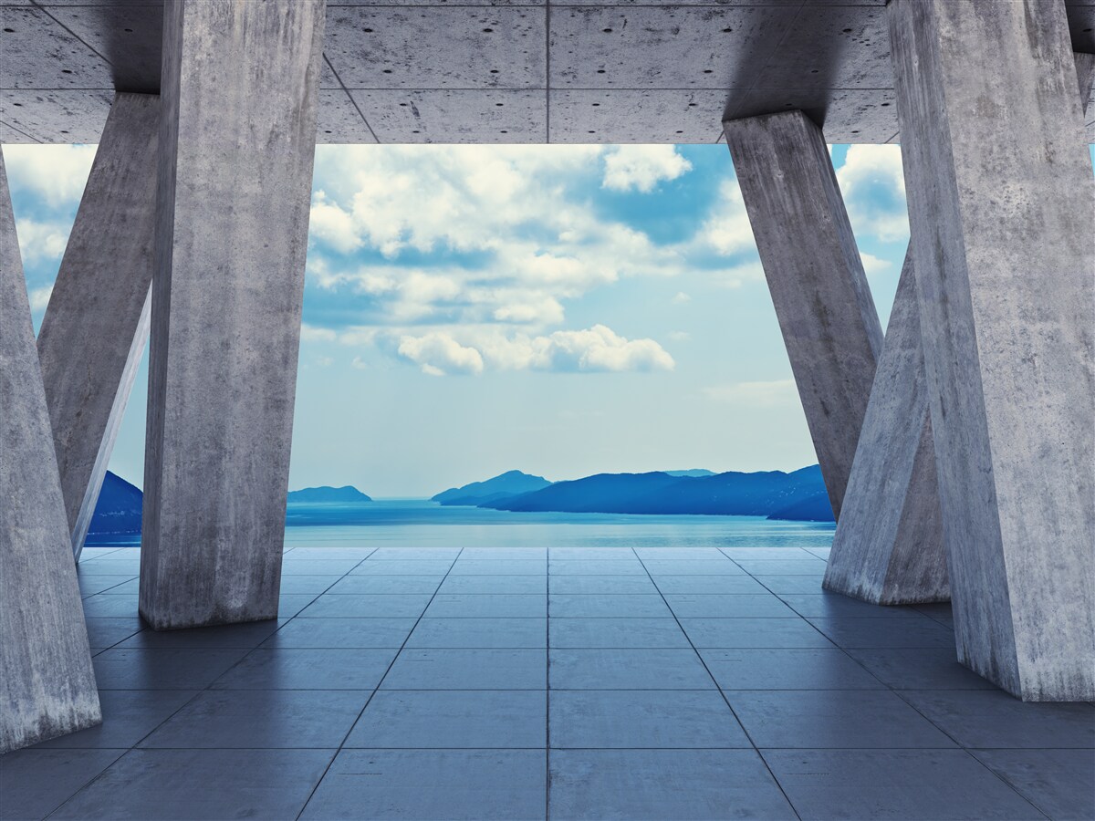 Фотошпалери Арки з бетону, що відкривають панораму гір і неба