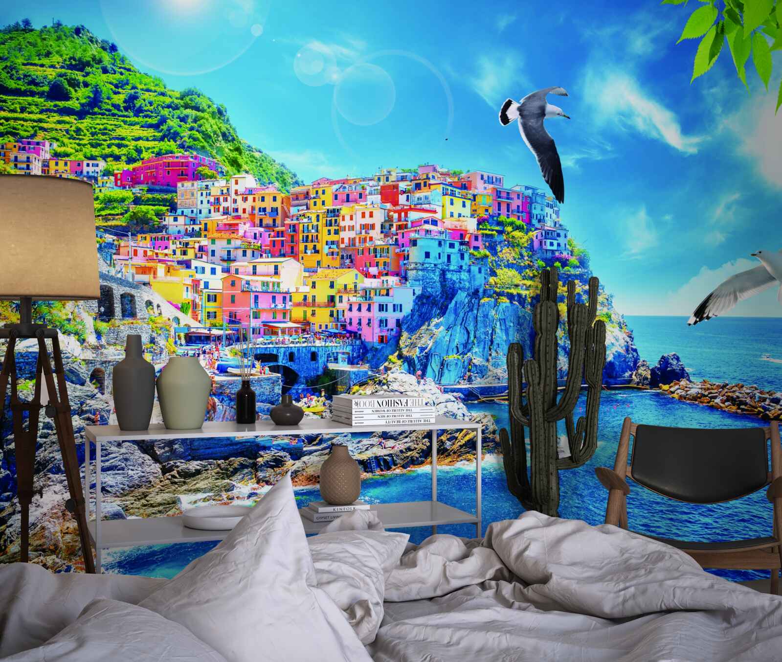 Фотошпалери маленьке містечко біля моря, на красивих скелях, залите яскравим світлом