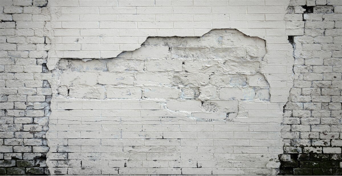 Фотошпалери стіна з сірого каменю та цегли