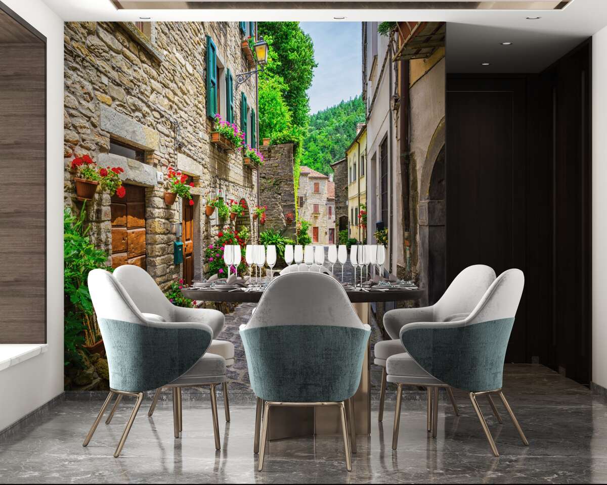 Фотошпалери стара кам'яна вулиця міста, оточена зеленню