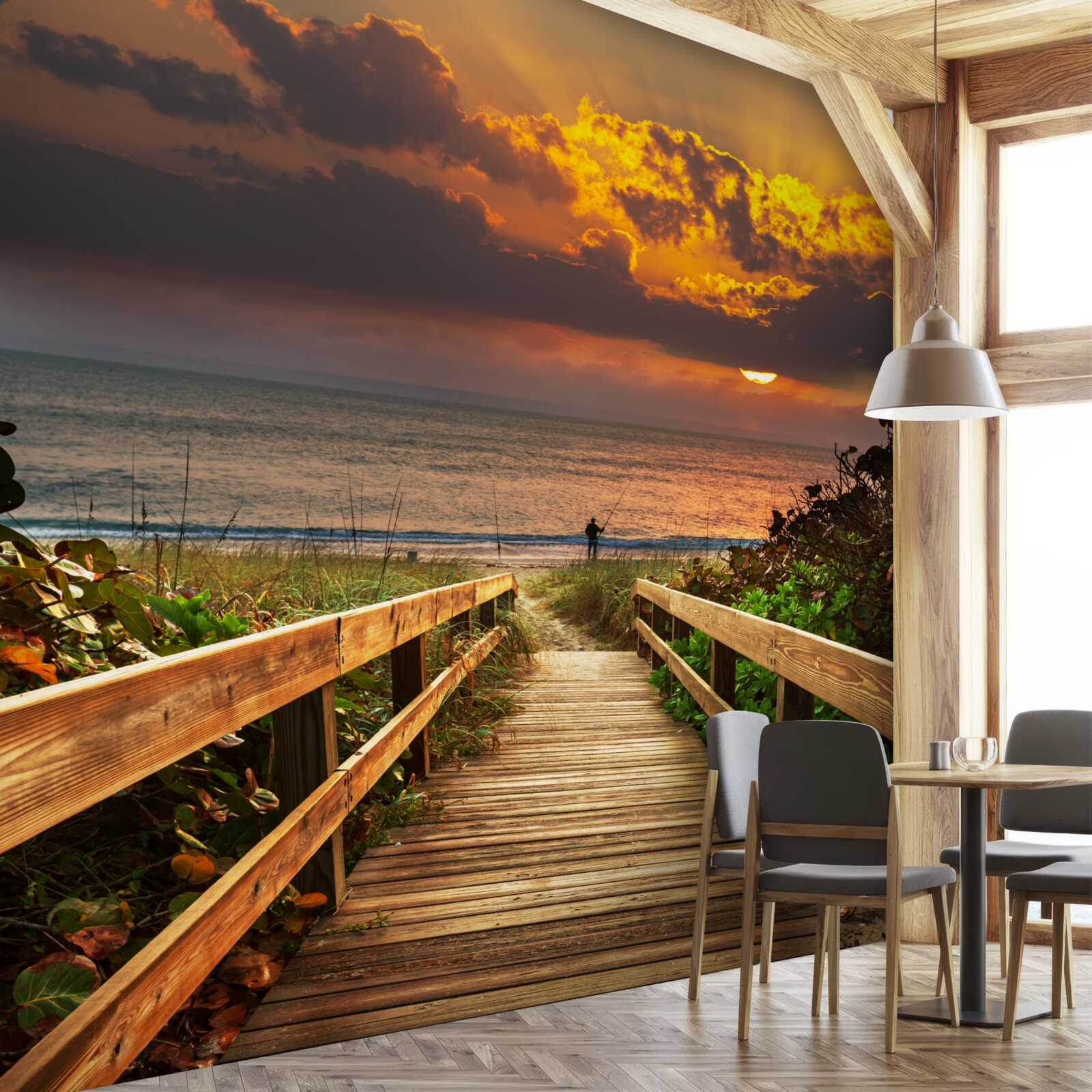 Фотошпалери сонце сідає за обрій на березі моря