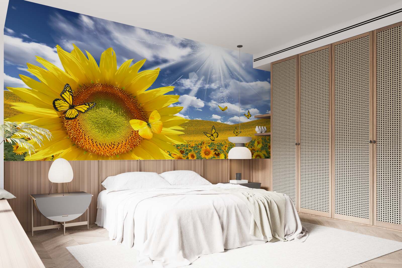 Фотошпалери золоті метелики літають у блакитному небі над полем соняшників