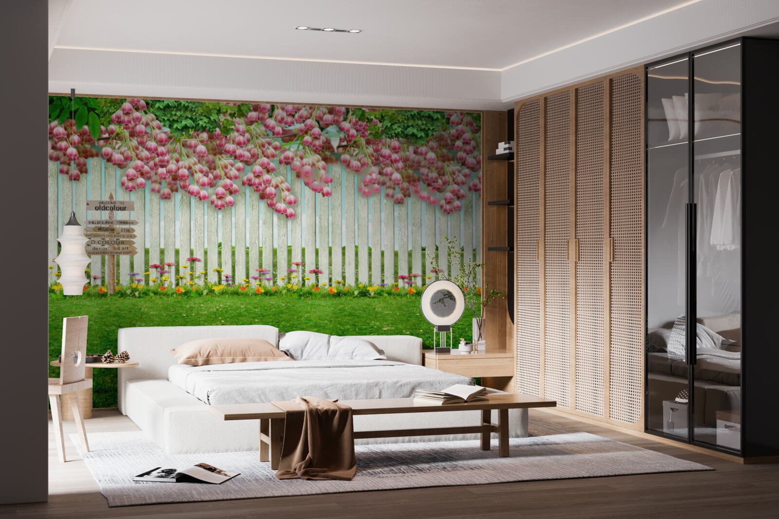 Фотошпалери рожеві квіти каскадом падають через білий паркан