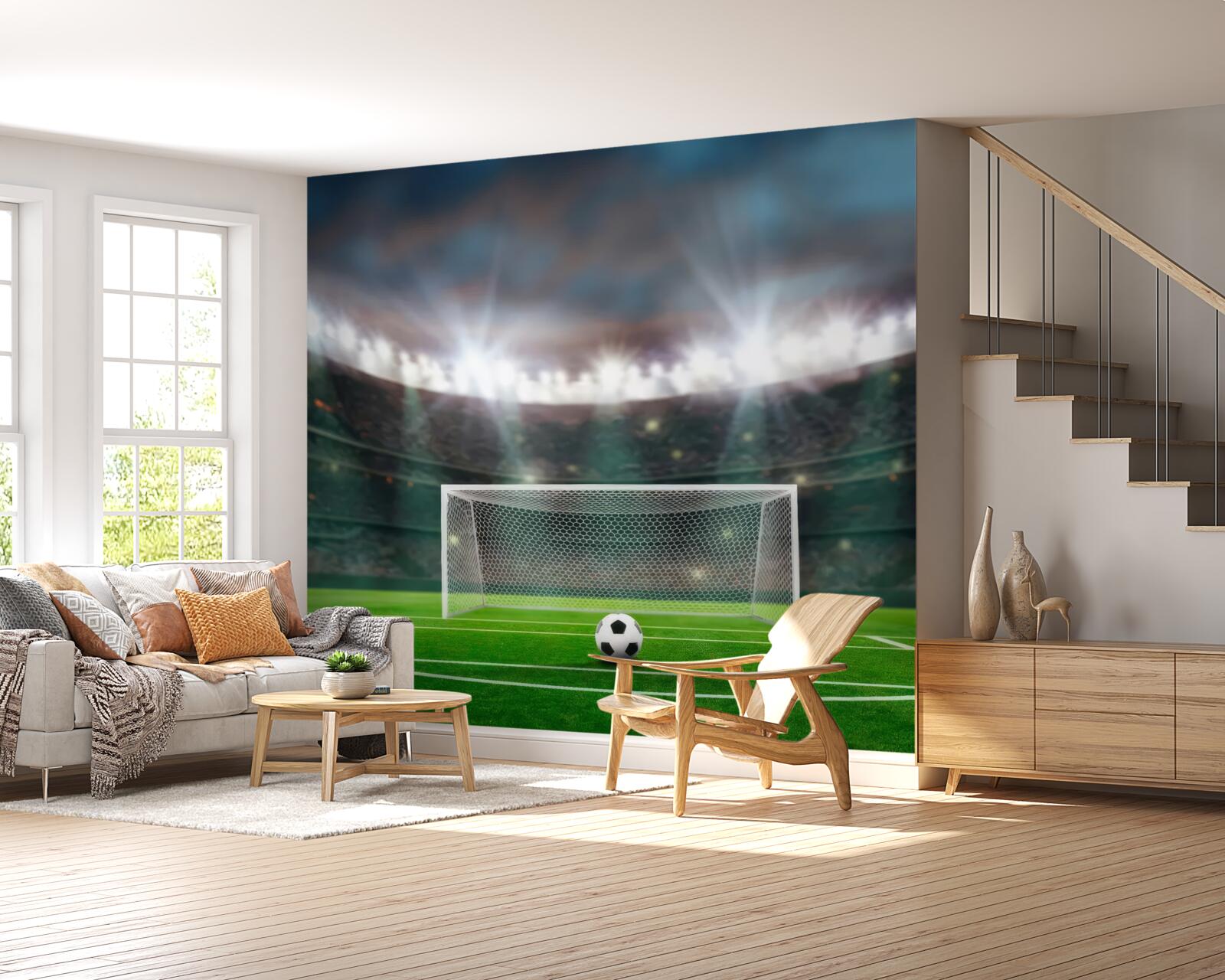 Фотошпалери на полі, поруч з воротами, лежить м'яч