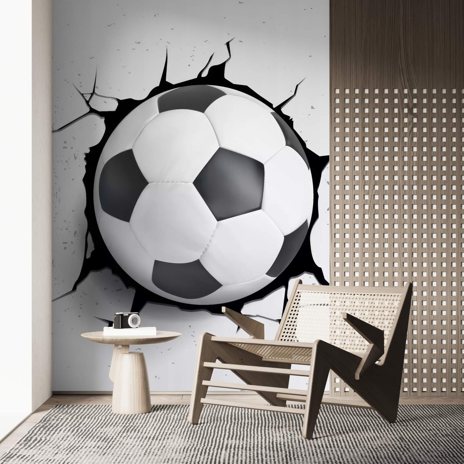 Фотошпалери зі стіни стирчить футбольний м'яч