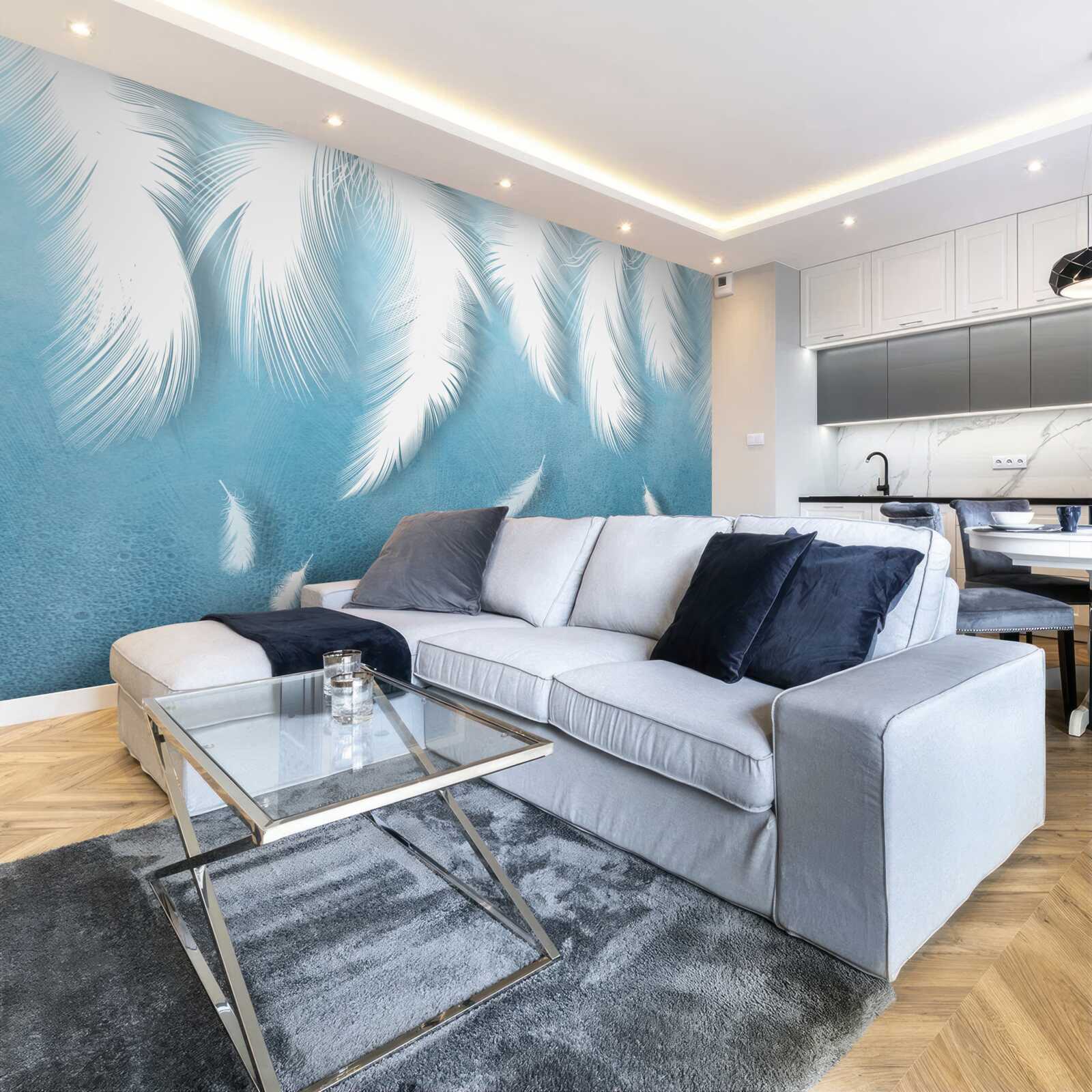 Фотошпалери біле пір'я, що падає в блакитне небо