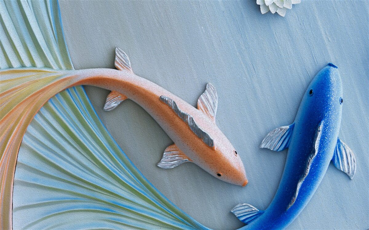 Фотошпалери у воді плавають золоті та блакитні рибки